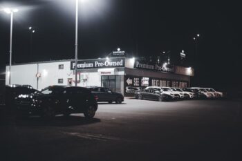 Row of used cars for sale on a dealership lot near Woodstock GA
