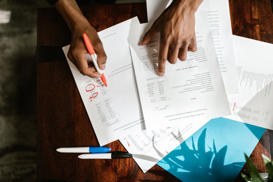 North Georgia car seller reviewing paperwork and offer details at a dealership desk